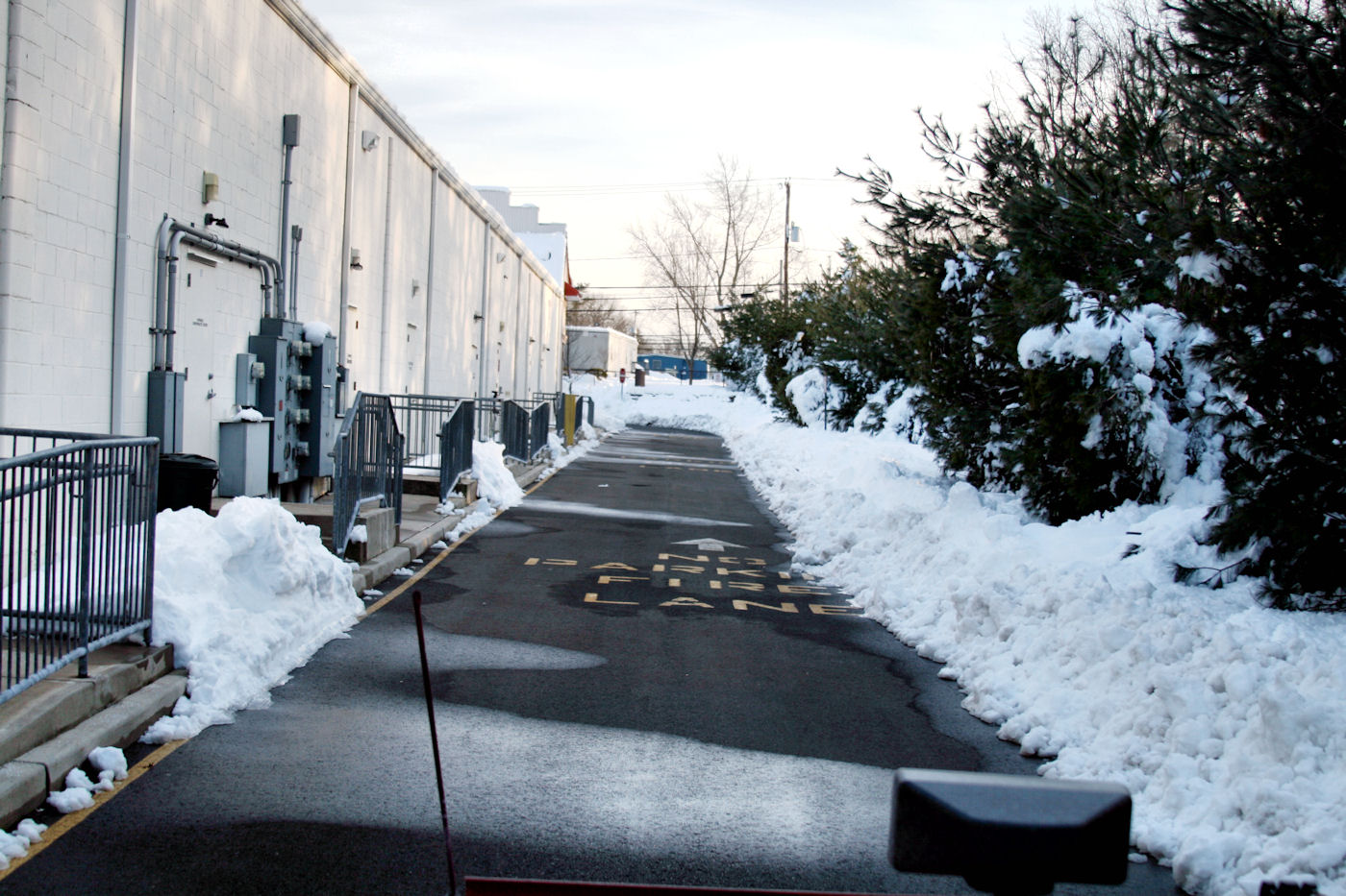 snow blade in a commercial lot